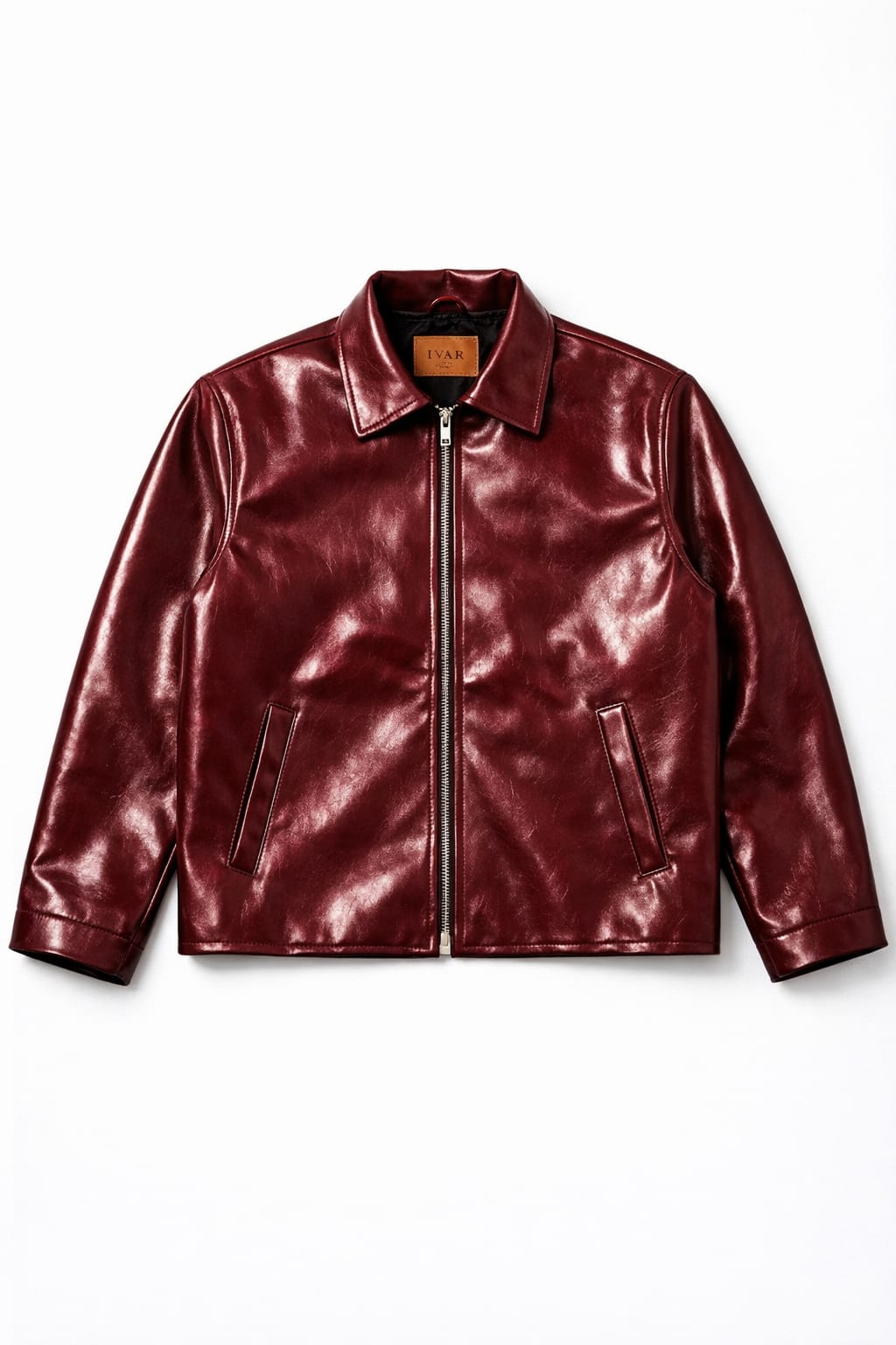 Close up of oxblood burgundy full grain leather texture on men's Harrington jacket