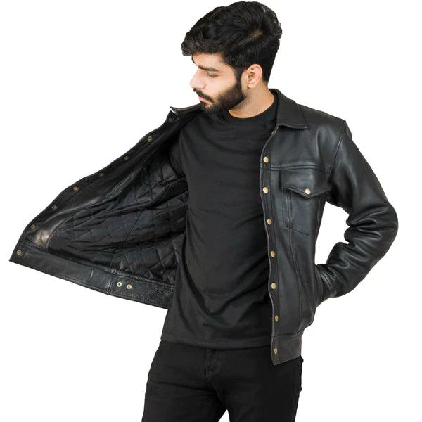 Detail of a black leather trucker jacket on a model