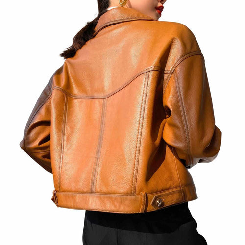 Women's Oversized Single-Breasted Leather Jacket in Orange, styled